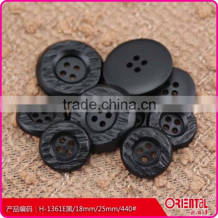 High end black plastic coat button with engrave pattern