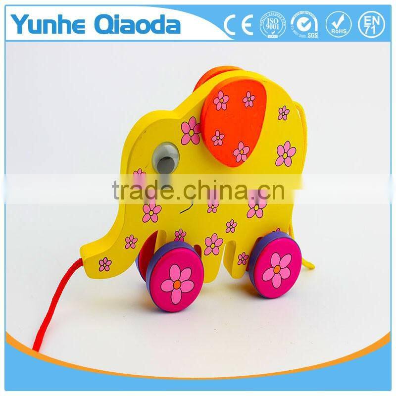 colorful Pull Along elephant Wooden Toy as you pull they make a fun for baby