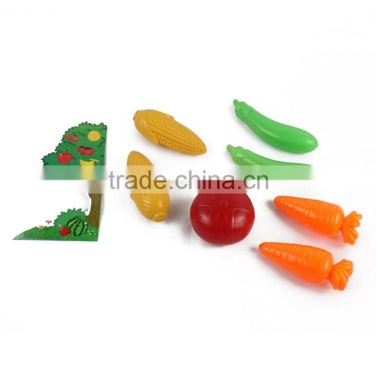 Children playing plastic toy vegetables with EN71