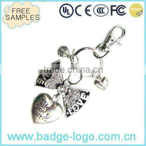 free sample heart shape novelty promotional couple metal keychain