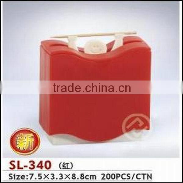 Plastic red toothpick jar