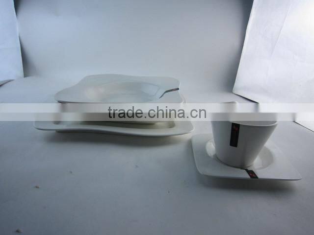 white waved porcelain dinner set with tea pot