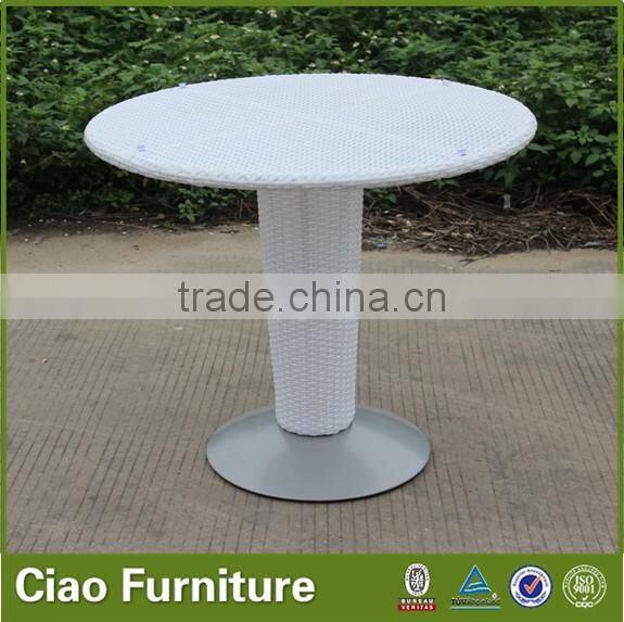 fiberglass and rattan outdoor table