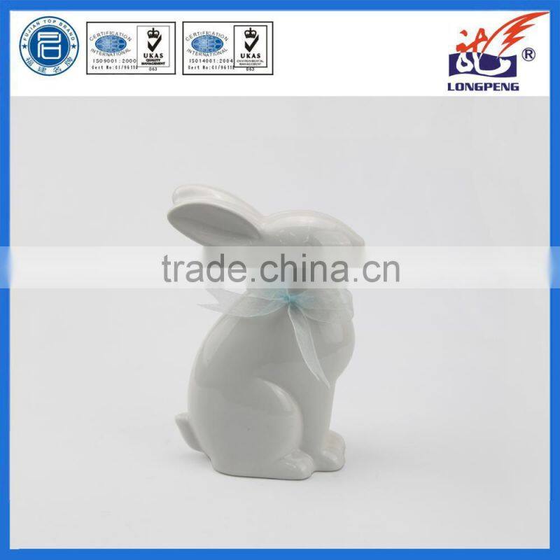 Ceramic Easter Bunny Rabbit Figurine with Blue Bow Ceramic Tabletop Figurine
