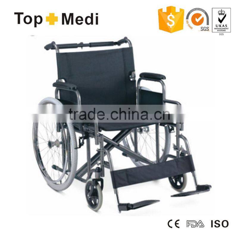 TOPMEDI Guangzhou foldable 24'' seat width steel wheelchair with swing away footrest