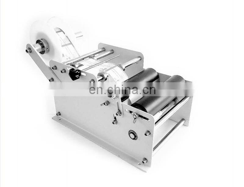 YTK-L100 handheld hand held manual round bottle labeling machine for bottle used,manual round bottle labeler