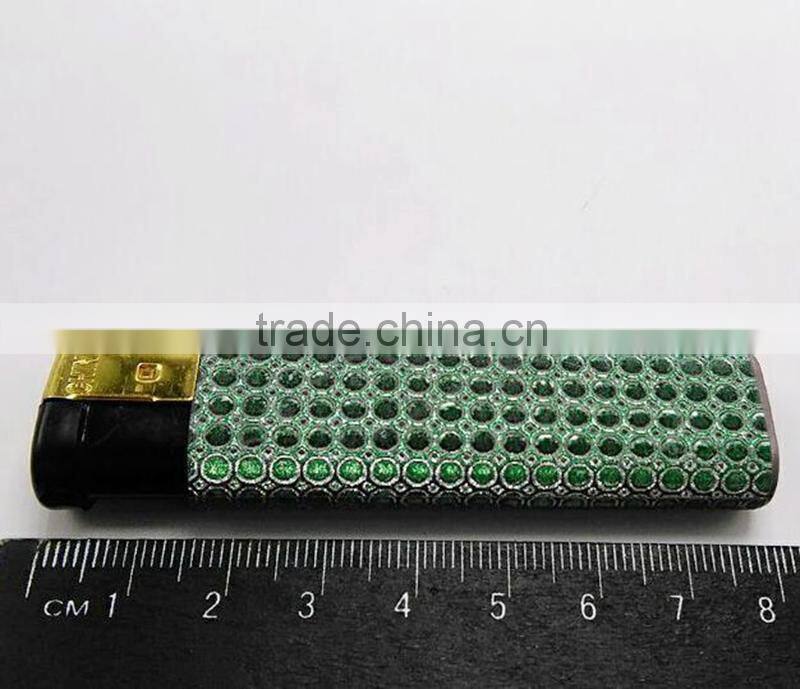 Silver match lighters colored with golden cap star lighter