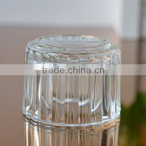 Glass candle container with round shaped for sale