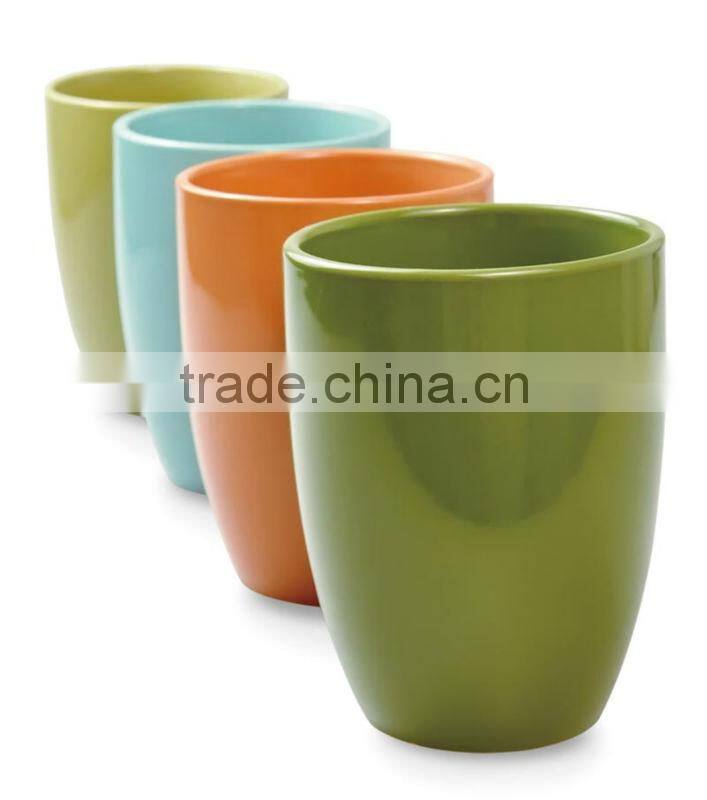 Stoneware garden pot with solid color