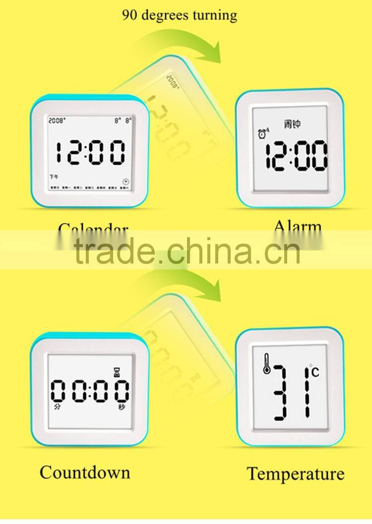 Best Teenager Home Promotional Gift OEM Multi-function Smart Digital Rotation Control Auto Light LCD Bedside Alarm Table Clock
