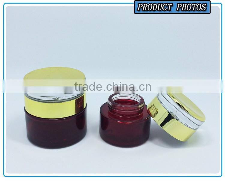 Cylinder RED coloured glass cosmetics bottles and face cream jars