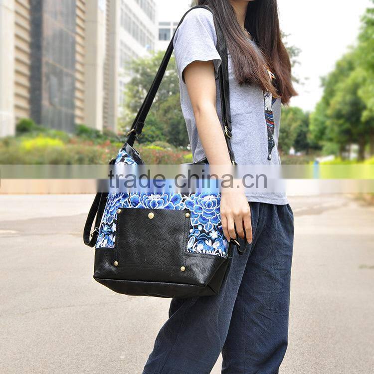 2015 new products leather handbag hmong girl handbag silk yarn embroidery backpack