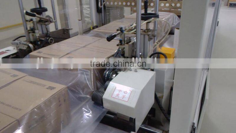 High speed fully automatic shrink wrapping machine