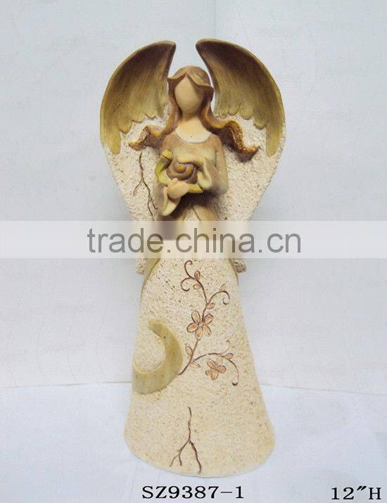 Resin fairy with a snail statue sculpture
