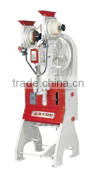 Automatic pneumatic shoe eyelet and rivet punching machine