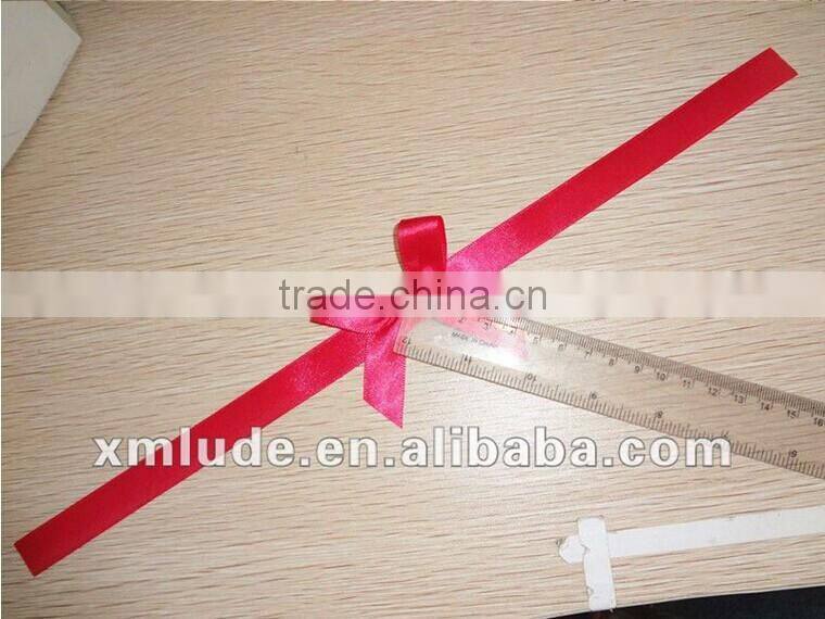 gold metallic ribbon bow with tie for decoration