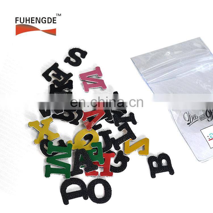 Double side hook and loop alphabet letters for T-shirt garments shoes
