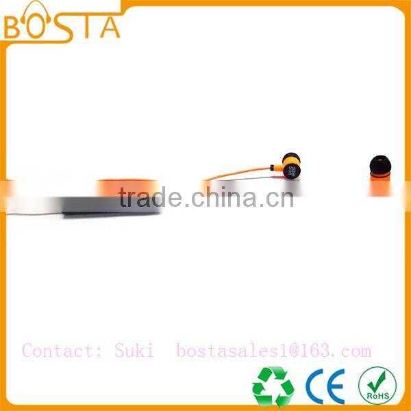 Sports sweat-proof wholesale shiny orange soft ruberized string bluetooth earphones