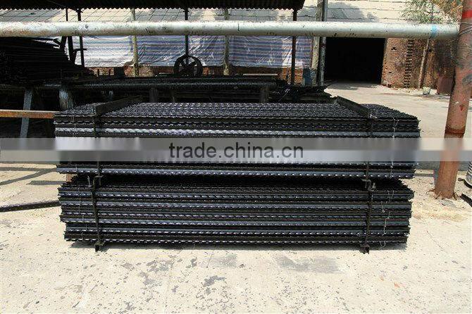 green painted farm fencing used t bar fence post