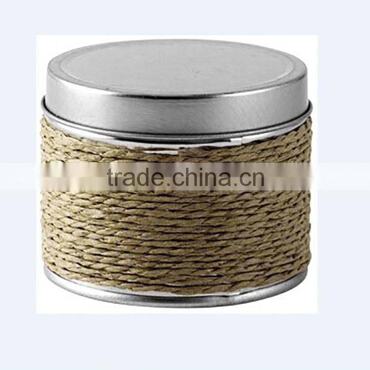 Silvery scented tin candle with string containers