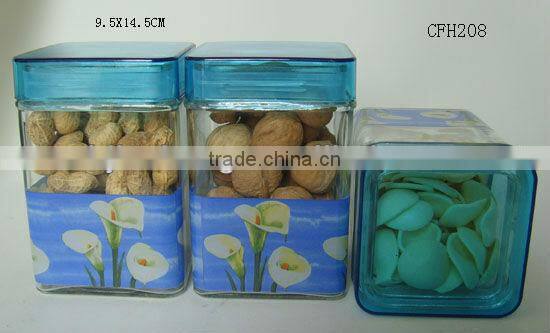 square blue plastic lid glass cookie jar