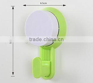 Vacuum suction cup kitchen and bathroom plastic hook/holder