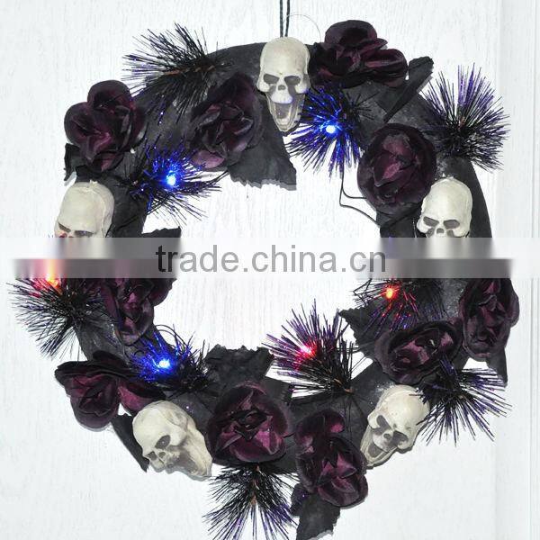 light up skull and skeleton on black rose and pine needles wreath for door decoration