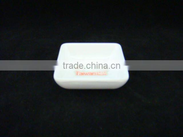 white round melamine sauce dish