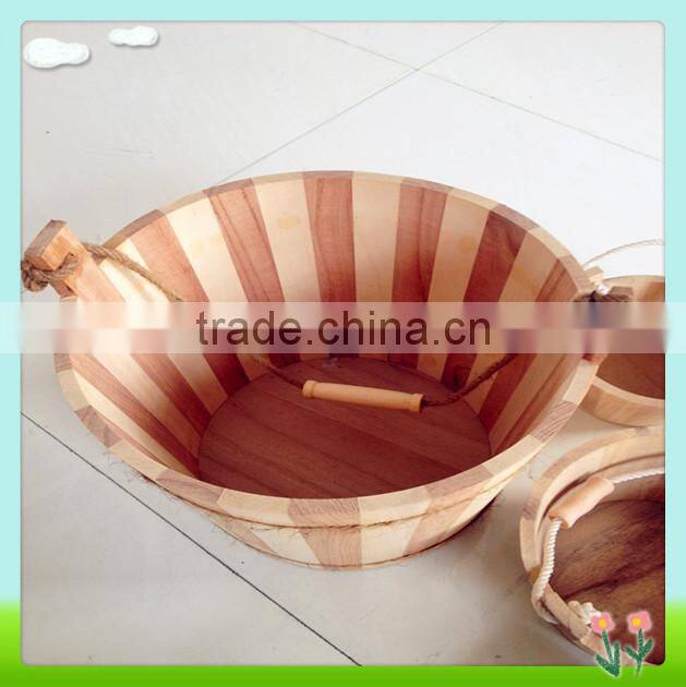 handmade wooden barrel or wooden bucket with water