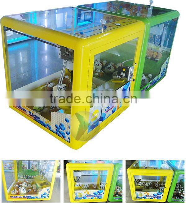 new design toy gift coin-operated game machine for kids / Magic Doll Cube mini toy crane machine