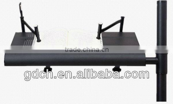 Portable folding notebook desk stand with mouse pad in bed