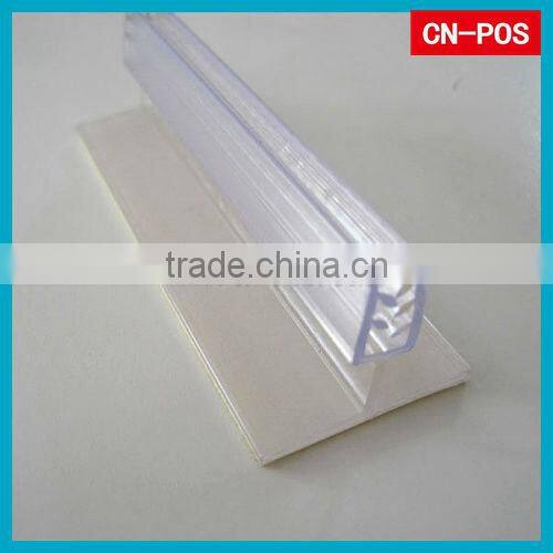 Flexibel adhesive plastic holder for hanging
