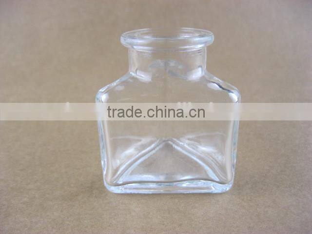 triangle shaped glass storage jar