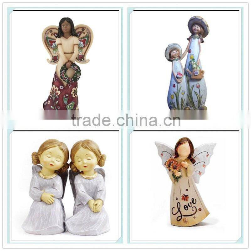 painted small resin angel figurine
