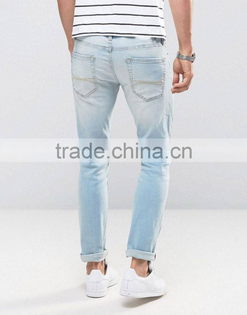 New Fashion Stretch Slim Jeans With Rips In Mid Wash for man