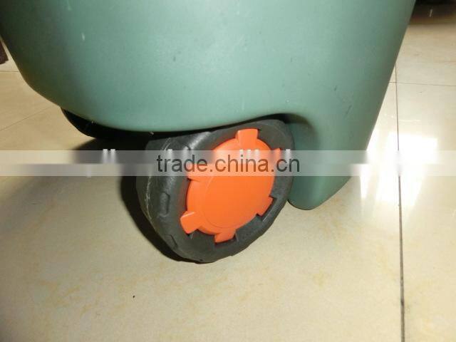 plastic trolley bin in garden , garden tool trolley