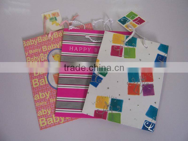 2013 wholesale beautiful and eco-friendly coated paper gift/candy bag --size22*10*24cm