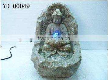 bodhisattva sitting on lotus pool fountain
