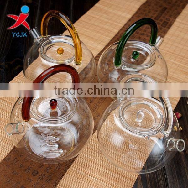 new design pyrex glass tea pot with colored glass handle