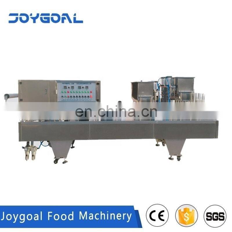 JOYGOAL Fully automatic plastic cup square box filling sealing machine for liquid water honey duck blood tofu sauce rolling film