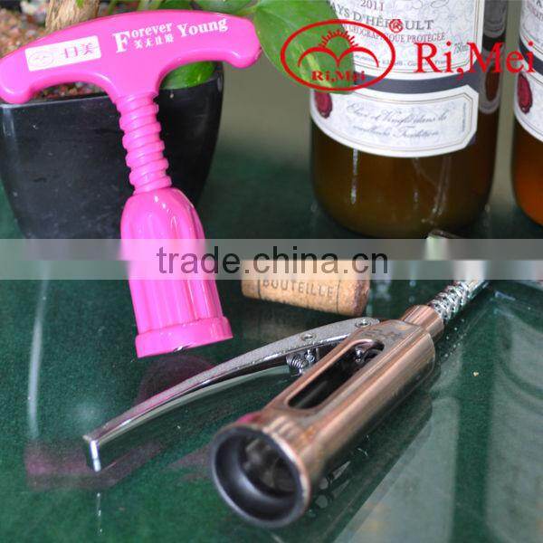 cast iron and plastic push down bottle opener