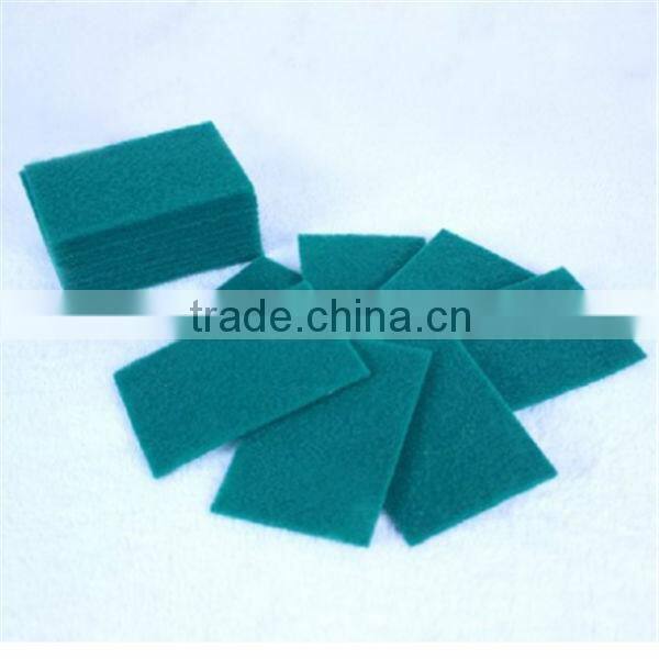 green scouring pad with synthetic fiber on one side