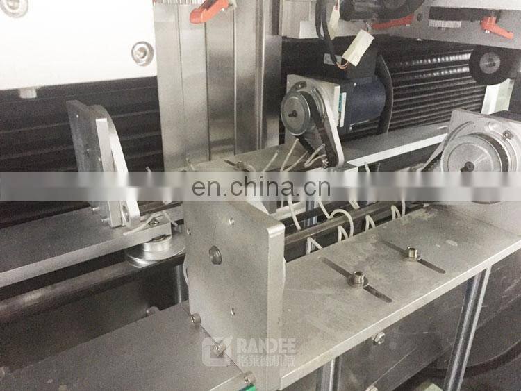 Automatic double head heat shrink sleeve label labeling machine for cup jelly