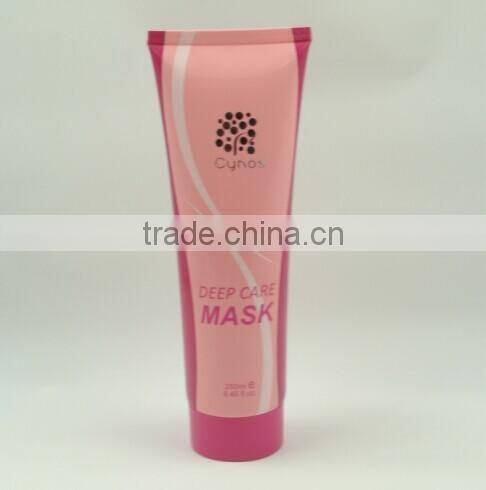 labeling collapsible empty tube with champagne aluminium cap