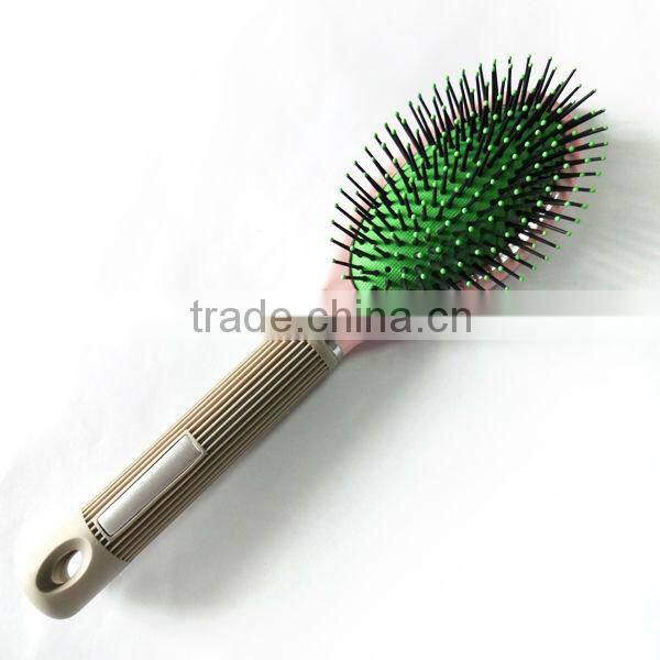 Steel pins plastic handle paddle hair brush