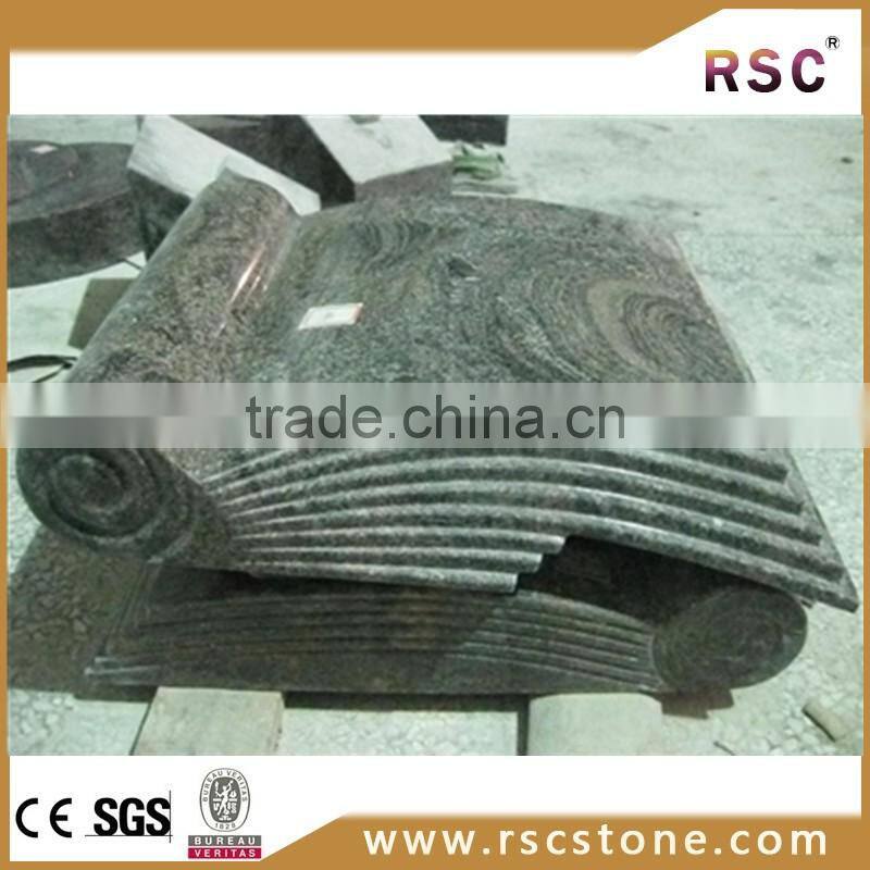 Grey cross granite tombstone