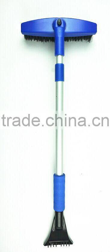 extendable rotating snow cleaning brush with scraper