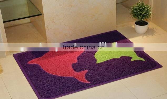Green plastic door mat