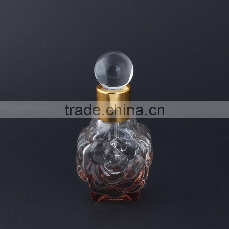 Wholesale fancy 12ml empty flower shaped mini glass perfume bottles with aluminum caps and glass stopper