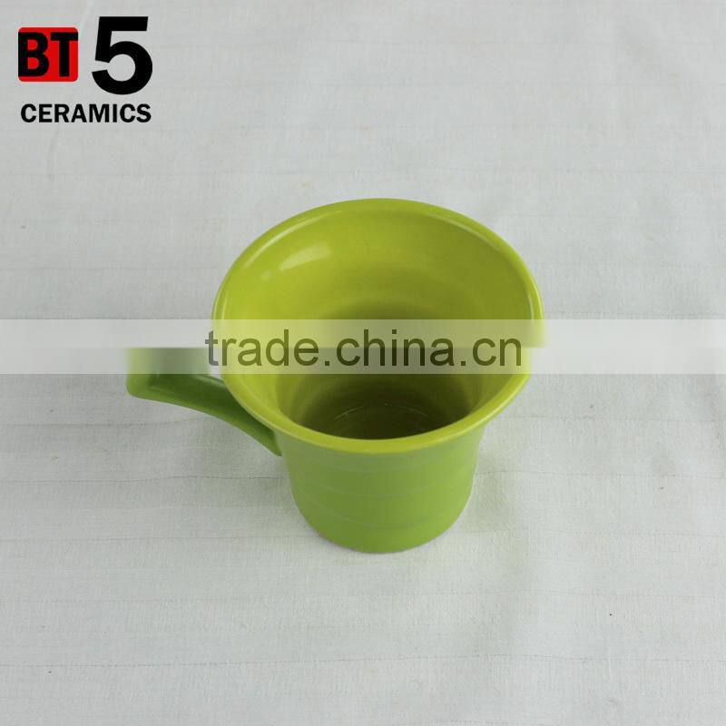 Different color inside and outside unique shape ceramic mug for sale